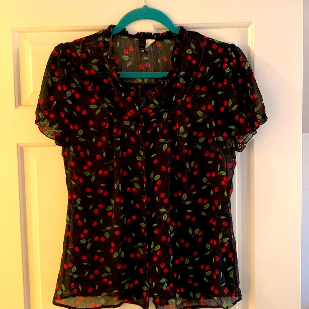 Sheer black shirt with cherries